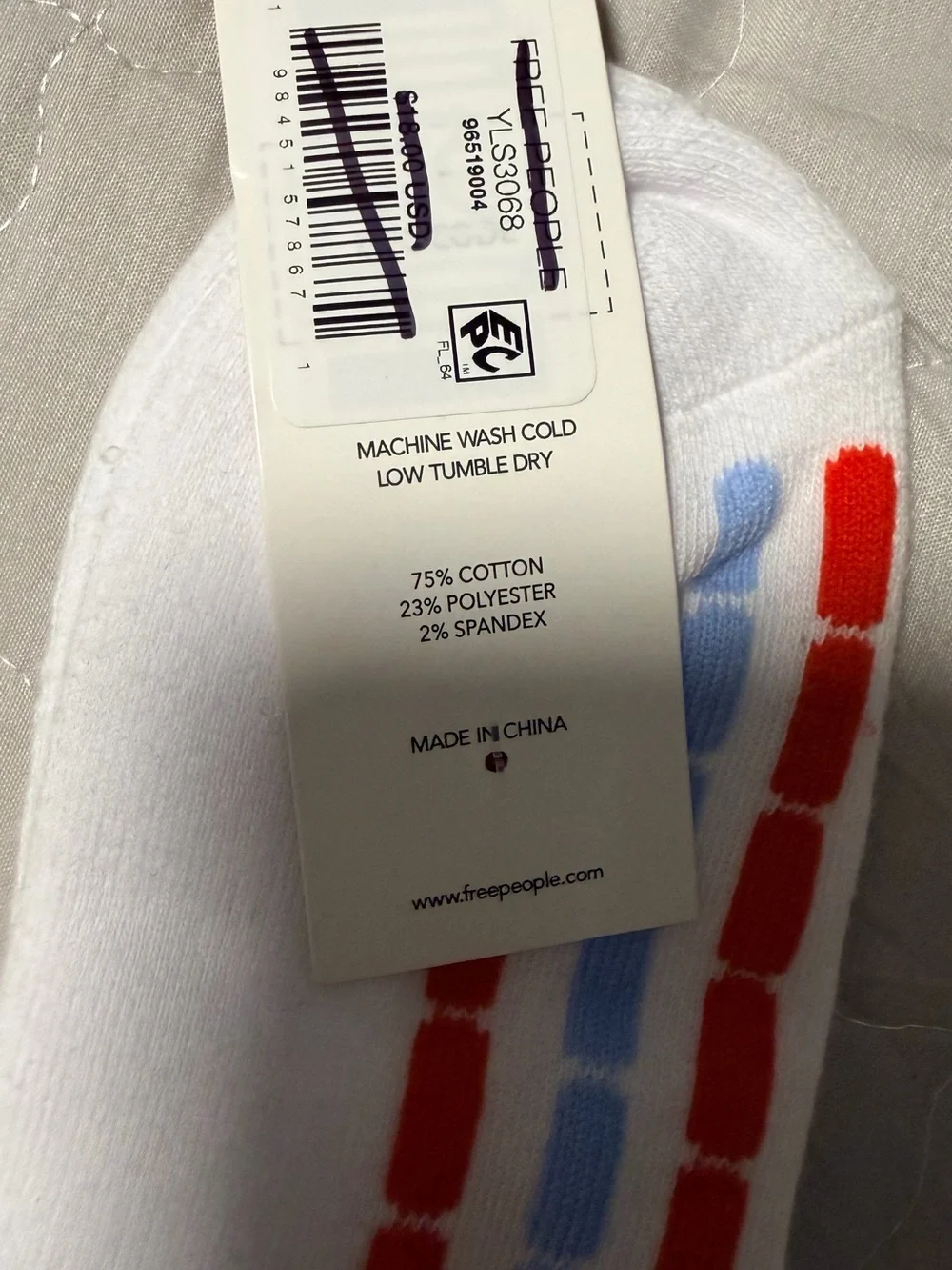 FP Movement Fast Lane Crew Socks in white with red and light blue